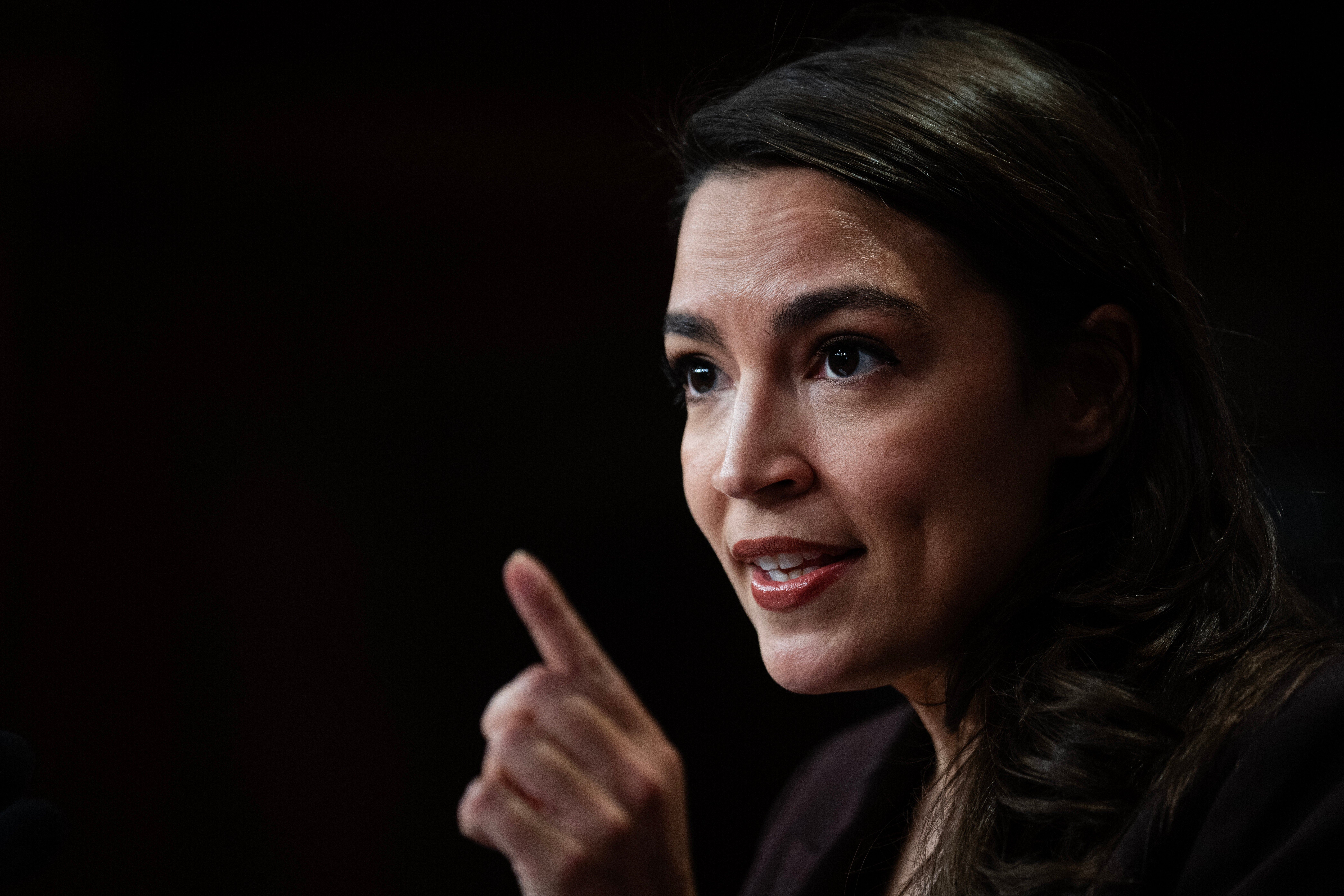 Ocasio-Cortez Calls for Cory Mills' Exit from Congress