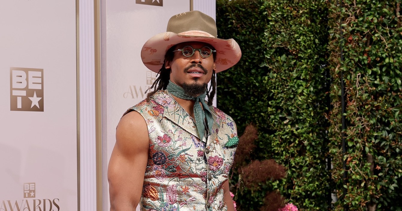 Ex-NFL Star Cam Newton Asserts Women’s ‘Worth’ Diminishes With Motherhood