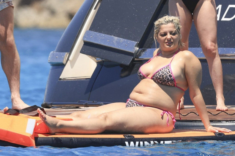 Bebe Rexha Struts Her Stuff in Leopard Print Bikini on Yacht After ‘Love Island’ Gig